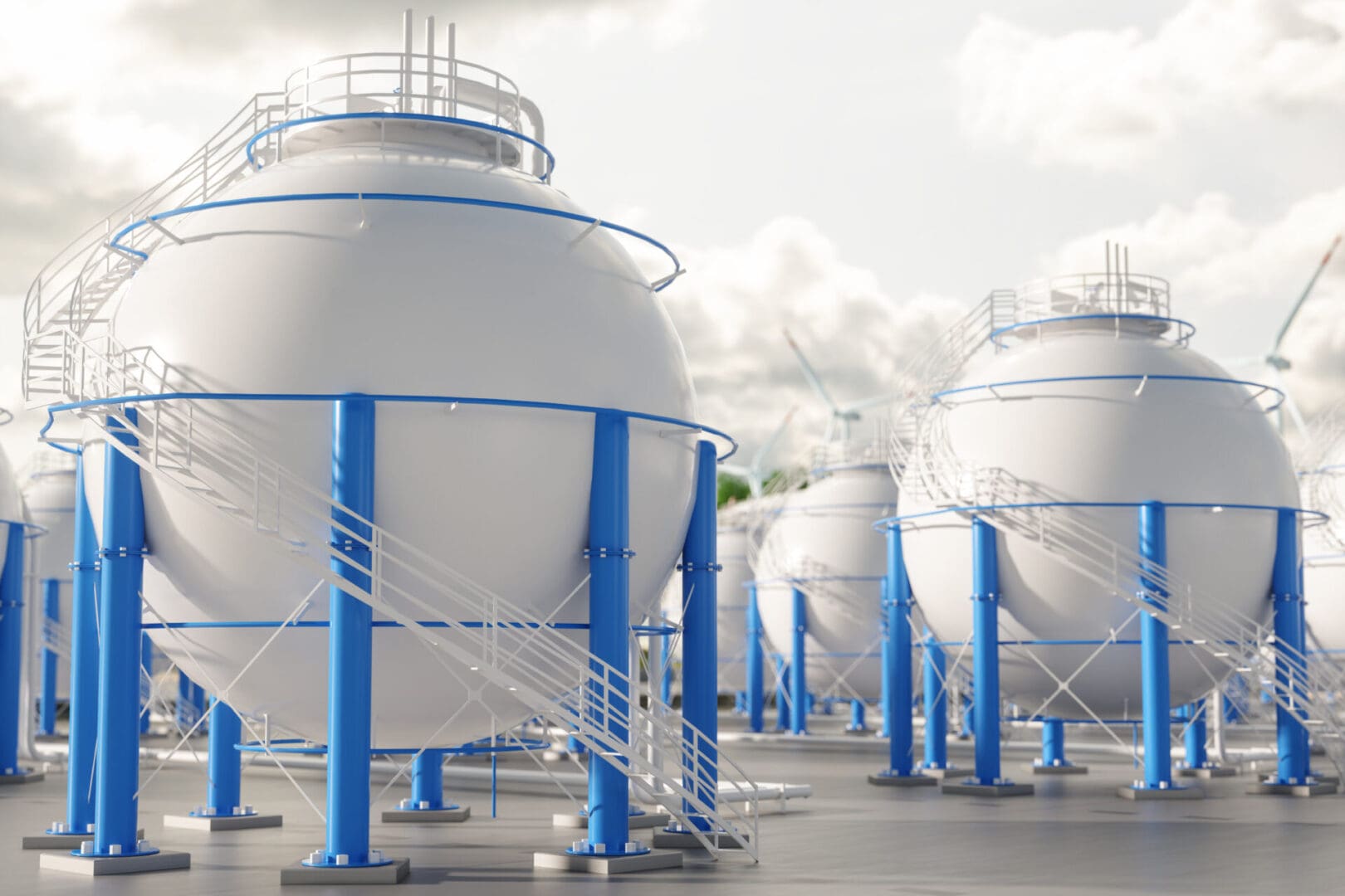 Close-up Of Storage Tanks With Wind Turbines Background Close-up Of Storage Tanks With Wind Turbines Background